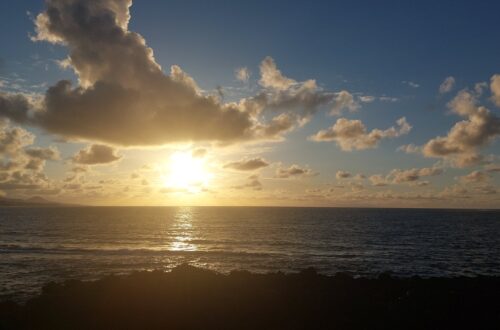 Sonnenuntergang am Las Canteras Beach als Symbol für Neubeginn